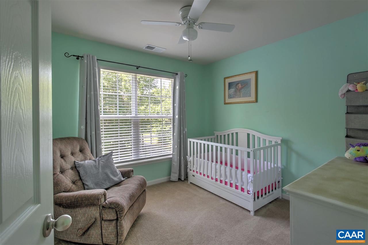 205 Jacoby Road Louisa, VA 23093 - Photo 12 of 21 a bedroom with a bed and a couch