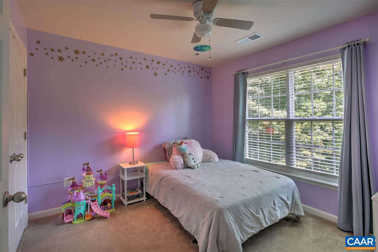 205 Jacoby Road Louisa, VA 23093 - Photo 14 of 21 a bedroom with a bed and a window