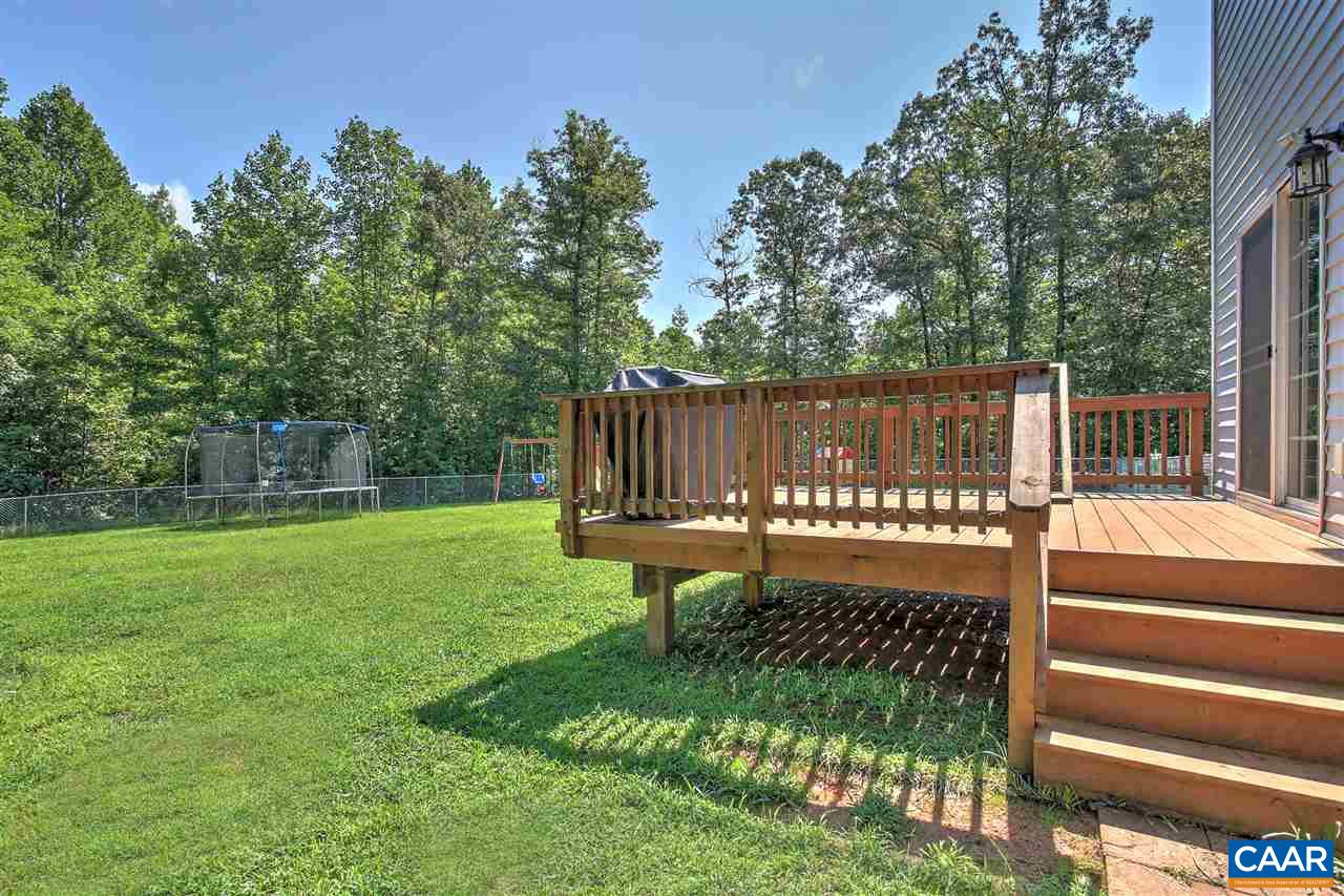 205 Jacoby Road Louisa, VA 23093 - Photo 16 of 21 a view of a bench in the garden