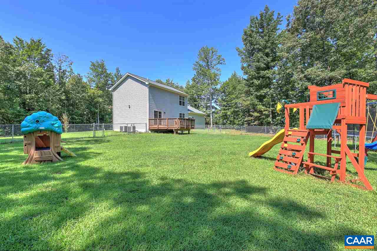 205 Jacoby Road Louisa, VA 23093 - Photo 17 of 21 a view of a house with pool and chairs