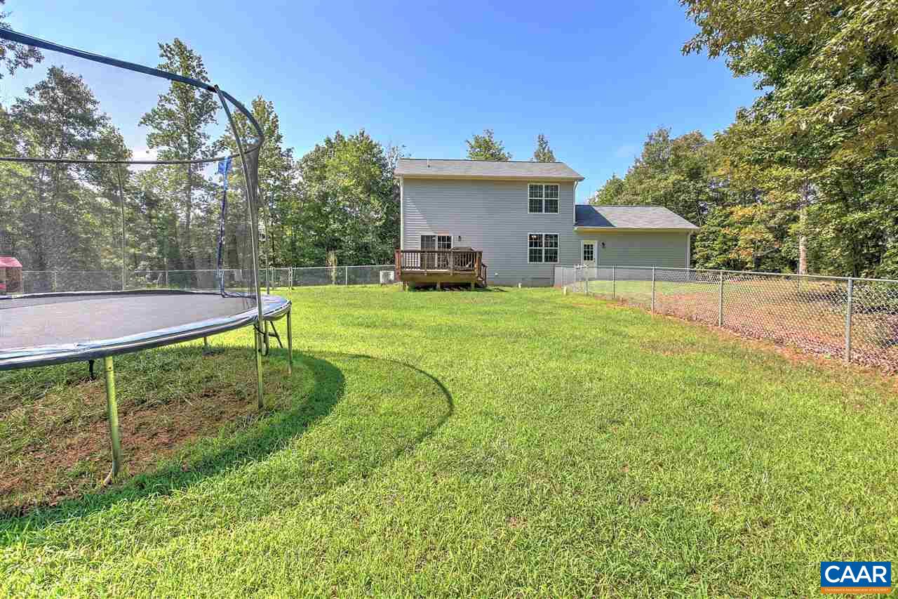 205 Jacoby Road Louisa, VA 23093 - Photo 18 of 21 a view of a house with a yard and tree s