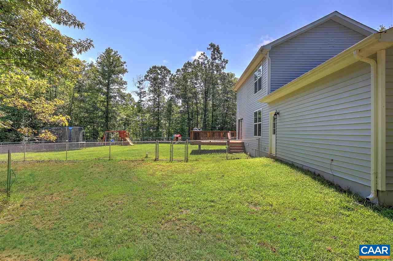 205 Jacoby Road Louisa, VA 23093 - Photo 19 of 21 a view of a house with a backyard