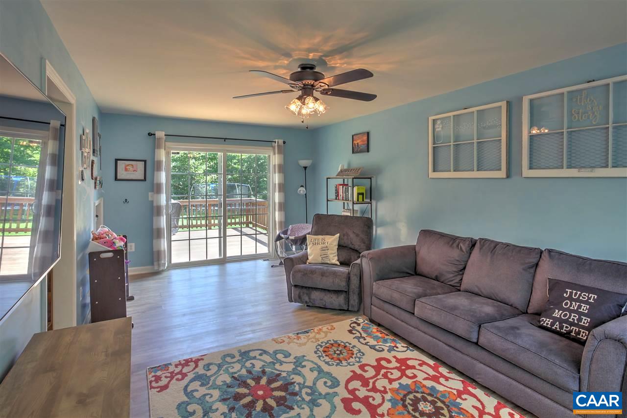 205 Jacoby Road Louisa, VA 23093 - Photo 4 of 21 a living room with furniture and a large window