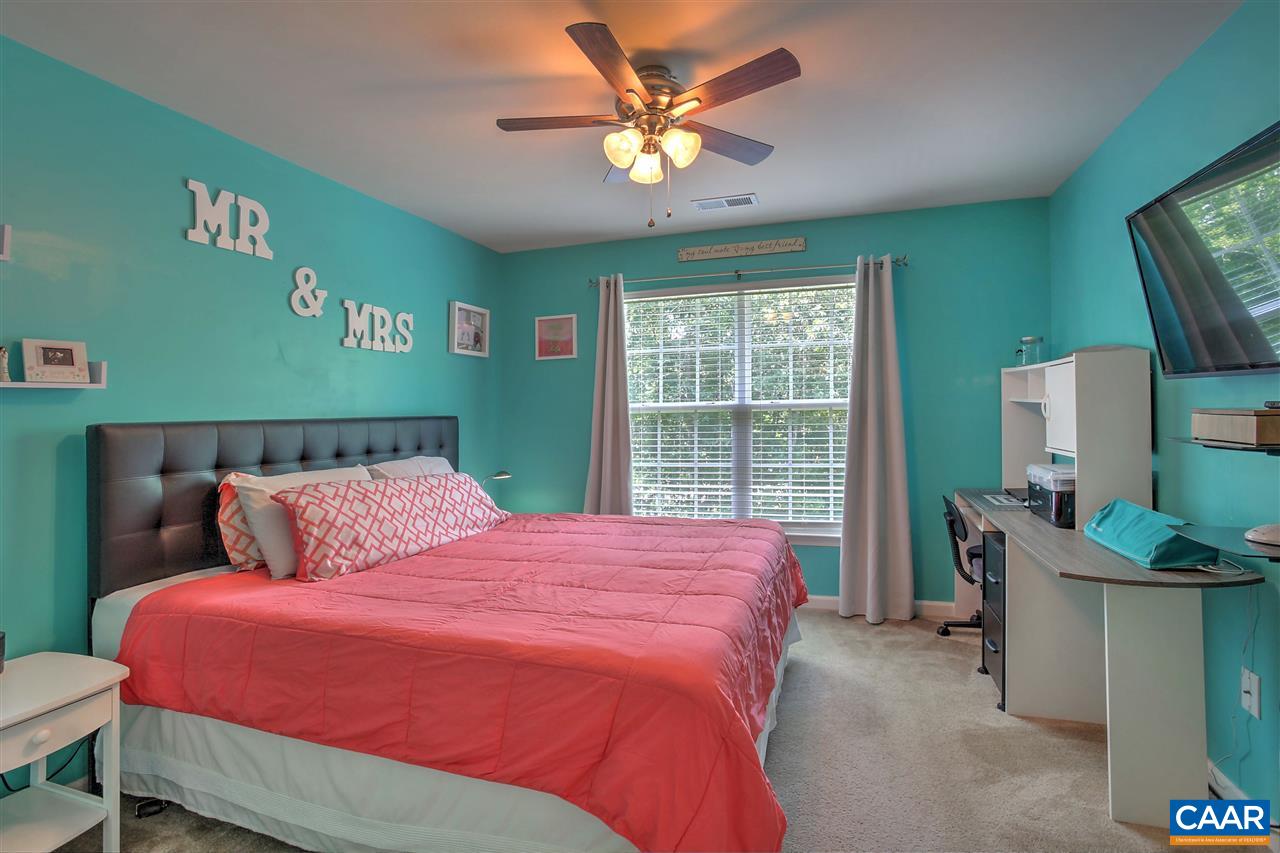 205 Jacoby Road Louisa, VA 23093 - Photo 10 of 21 a bedroom with a bed dresser and a window