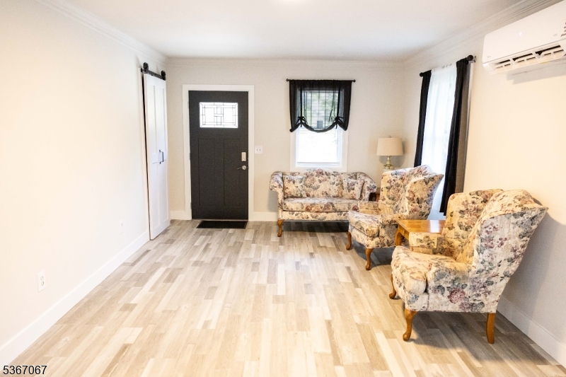 4 Bear Pond Trail Hopatcong, NJ 07821 - Photo 3 of 20 a bed room with a bed and a couch