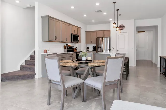 a view of a dining room with furniture