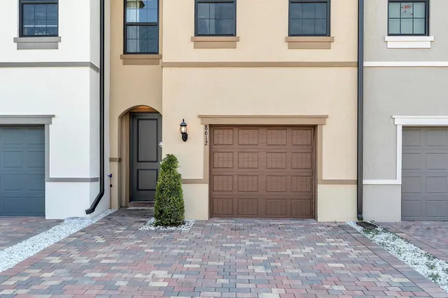 a view of a house with garage