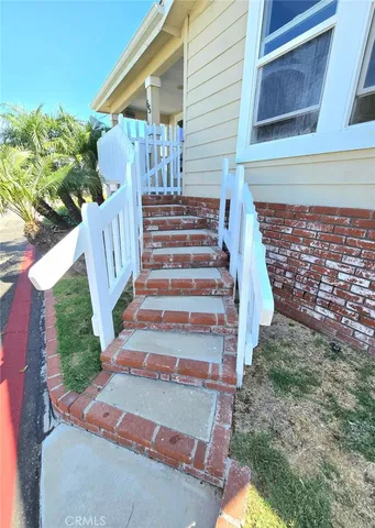 a view of entryway with flower pots