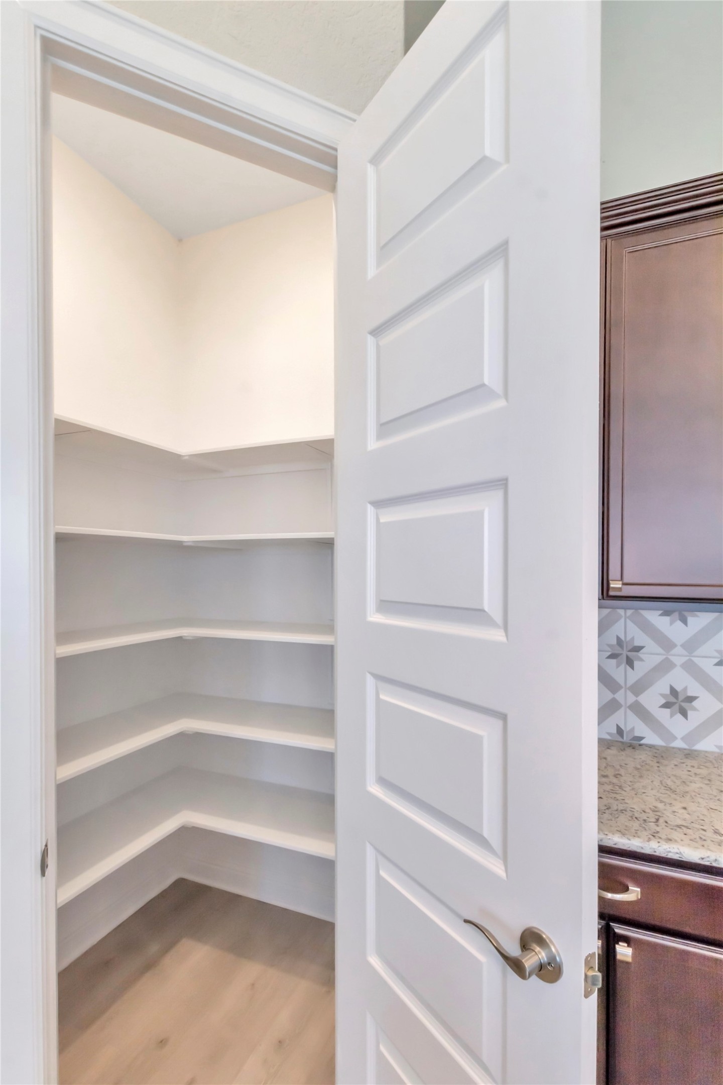2140 Base Burner Path Leander, TX 78641 - Photo 12 of 27 a view of walk in closet with empty racks