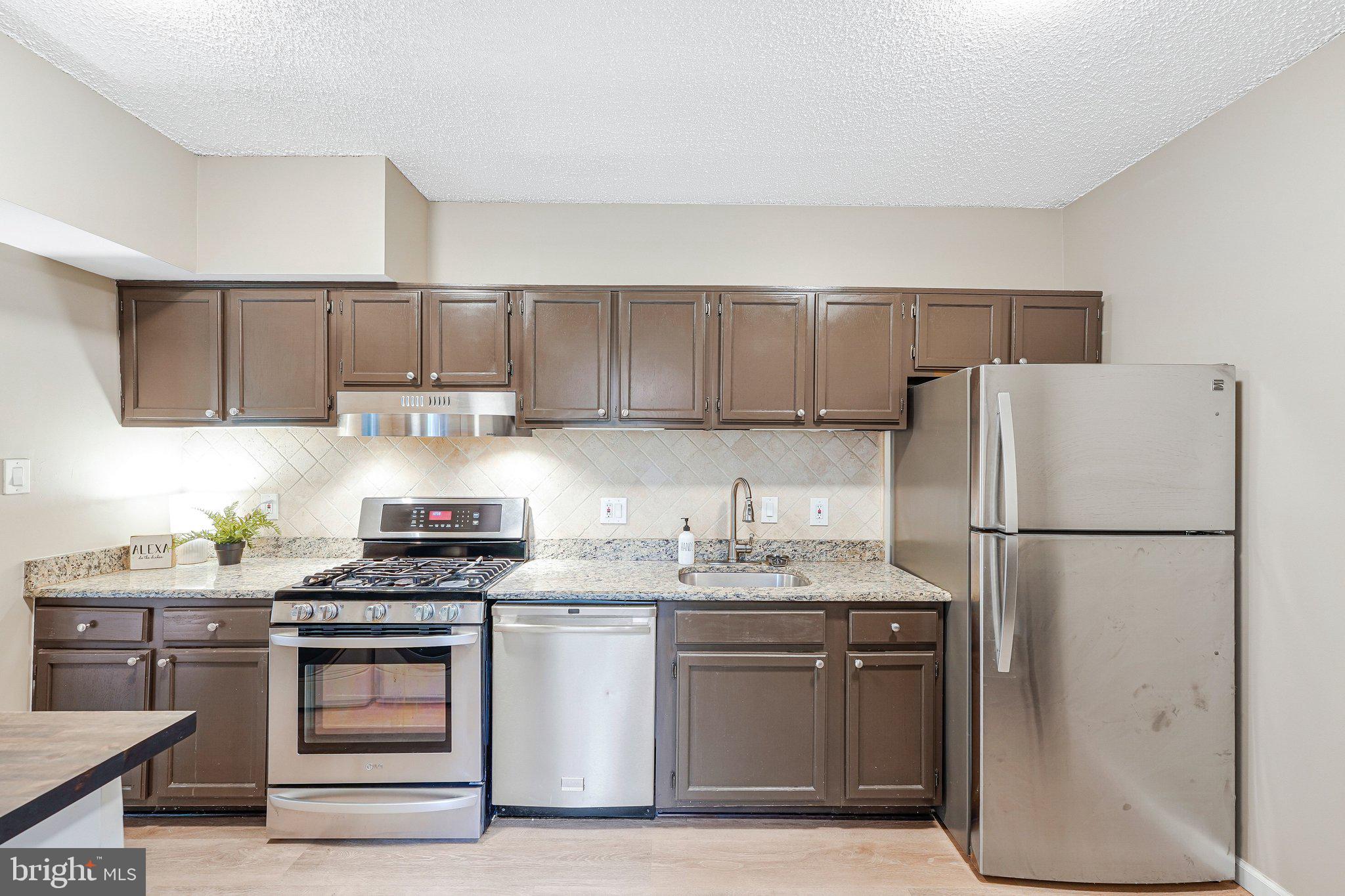 11804 Breton Court, Unit 1A Reston, VA 20191 - Photo 7 of 19 Updated Kitchen