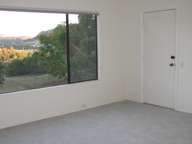 10085 El Capitan Real Road El Cajon, CA 92021 - Photo 17 of 25 Downstairs family room opens to the huge backyard.....