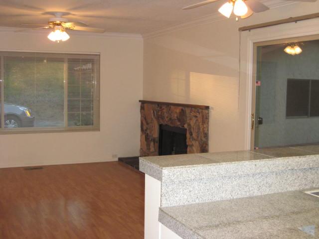 10085 El Capitan Real Road El Cajon, CA 92021 - Photo 7 of 25 The cozy family room off the kitchen with fireplace