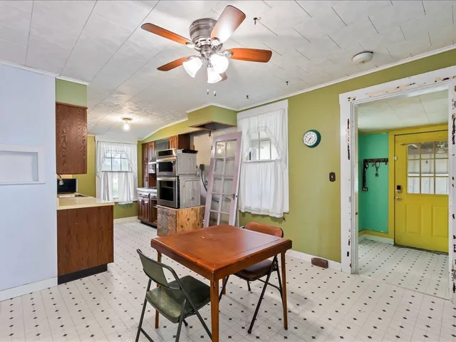 a view of a dining room with furniture