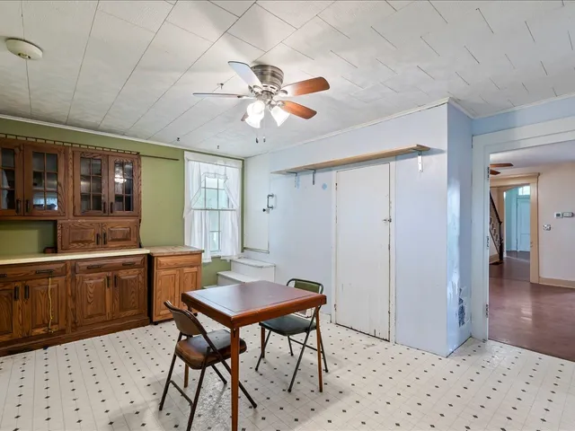 a view of a hallway with windows