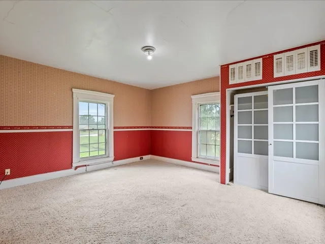 an empty room with closet