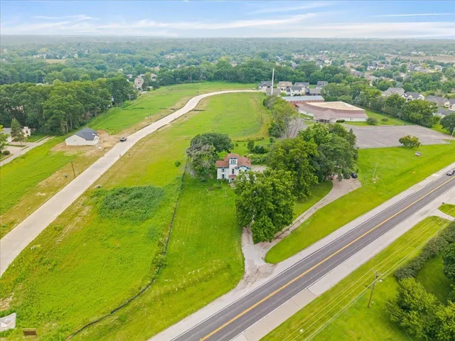 a view of a swimming pool with a garden