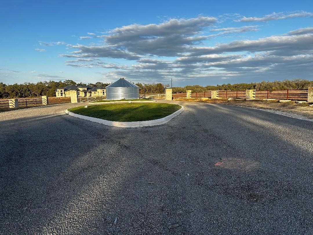 642 Windmill Ridge Drive Blanco, TX 78606 - Photo 4 of 29 a view of a lake with houses