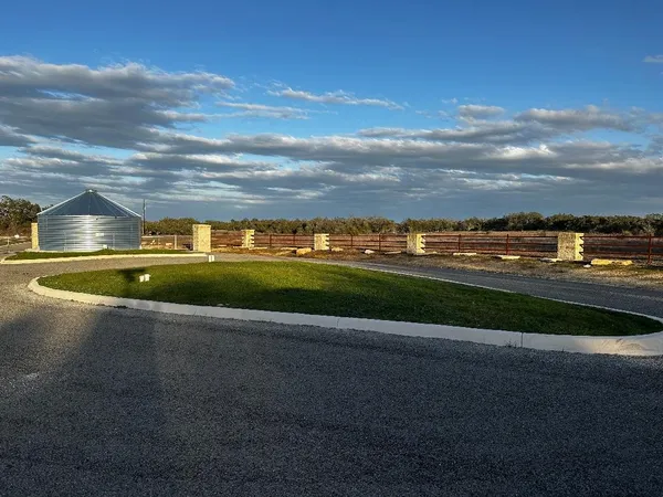 a view of a lake with a big yard