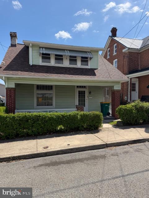 129 Ridge Avenue Waynesboro, PA 17268 - Photo 1 of 17 a front view of a house with a yard