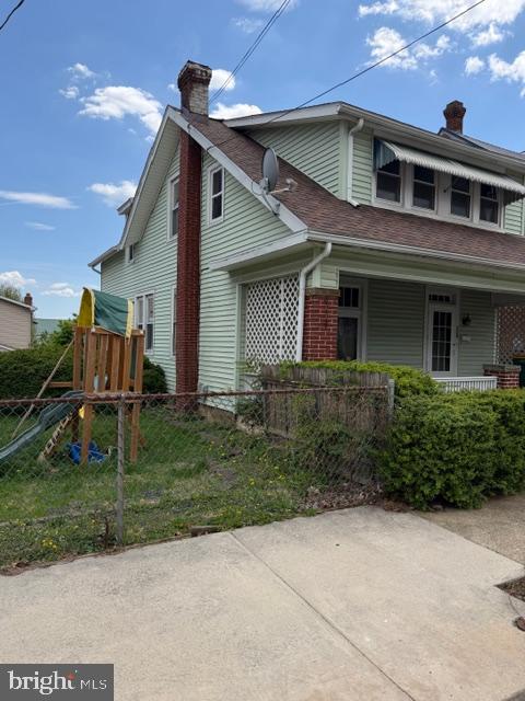 129 Ridge Avenue Waynesboro, PA 17268 - Photo 17 of 17 a front view of a house with garden