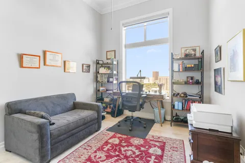 a living room with furniture and a couch