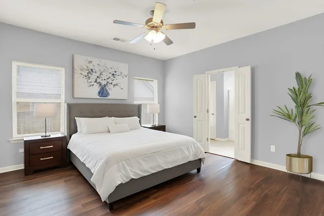 a bathroom with a sink toilet and mirror