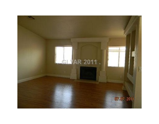 637 West Victory Road Henderson, NV 89015 - Photo 3 of 23 Living Room. COZY WOOD BURNING FIREPLACE IN THE LIVING ROOM