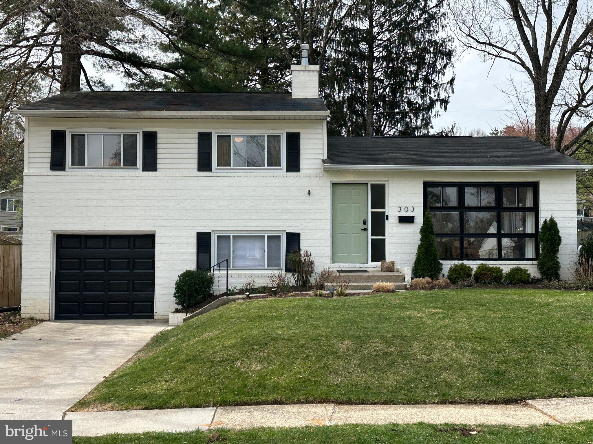 303 Galway Road Lutherville-Timonium, MD 21093 - Photo 1 of 1 a front view of a house with a yard