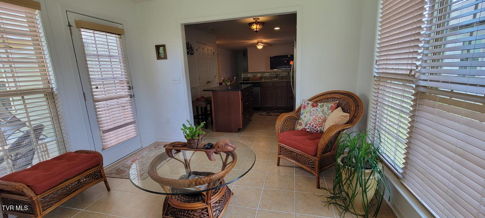 687 Suffolk Road Johnson City, TN 37615 - Photo 10 of 25 Sunroom to kitchen/ patio