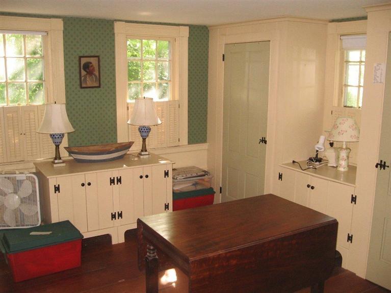 311 Tonset Road Orleans, MA 02653 - Photo 12 of 20 a bedroom with a bed and a dresser