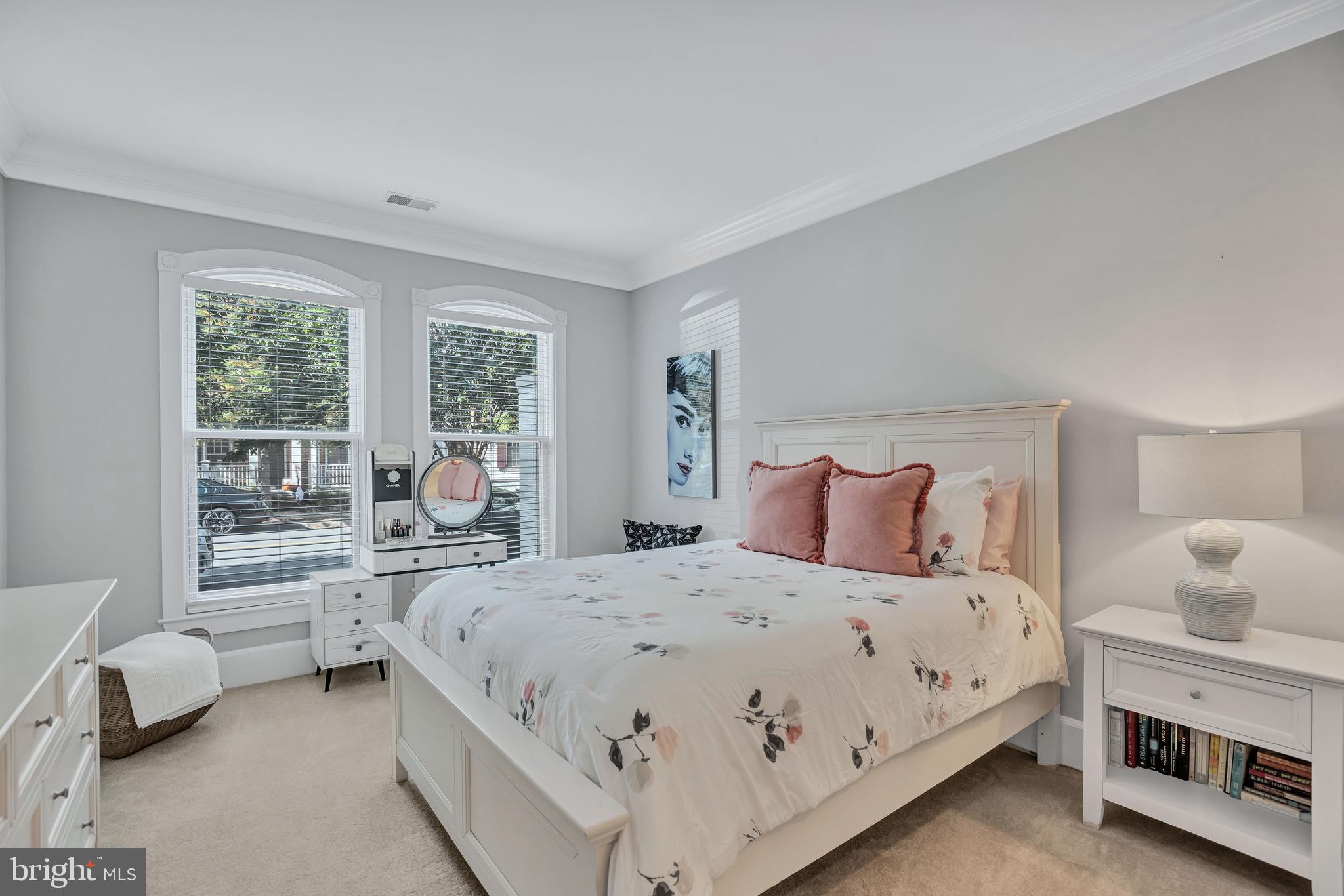 910 Powhatan Street, Unit 104N Alexandria, VA 22314 - Photo 19 of 60 a bedroom with a bed and a couch