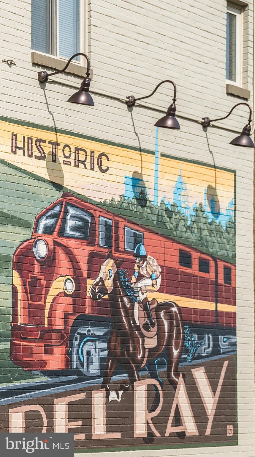 910 Powhatan Street, Unit 104N Alexandria, VA 22314 - Photo 48 of 60 a front view of a building with glass windows