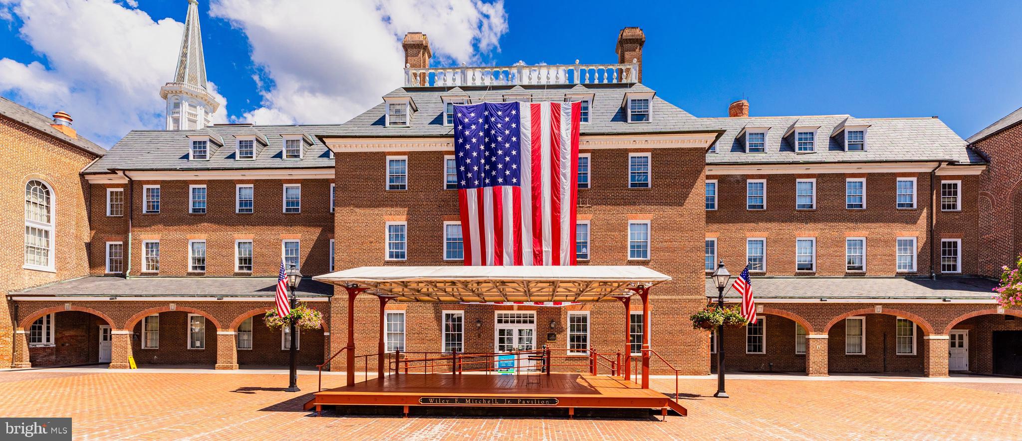 910 Powhatan Street, Unit 104N Alexandria, VA 22314 - Photo 59 of 60 a front view of a building with glass windows