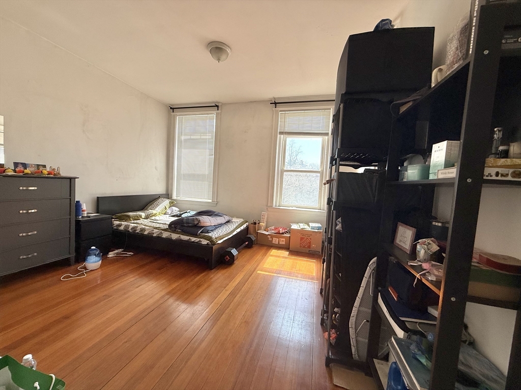 1908 Beacon Street, Unit 2 Brookline, MA 02445 - Photo 11 of 22 a living room with furniture and a flat screen tv