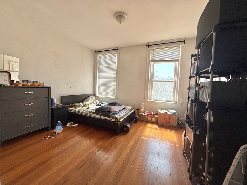 1908 Beacon Street, Unit 2 Brookline, MA 02445 - Photo 18 of 22 a living room with furniture and a flat screen tv