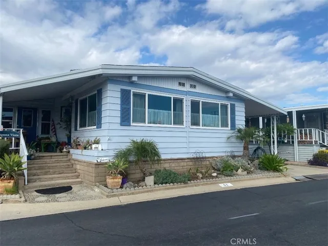 front view of house with a yard