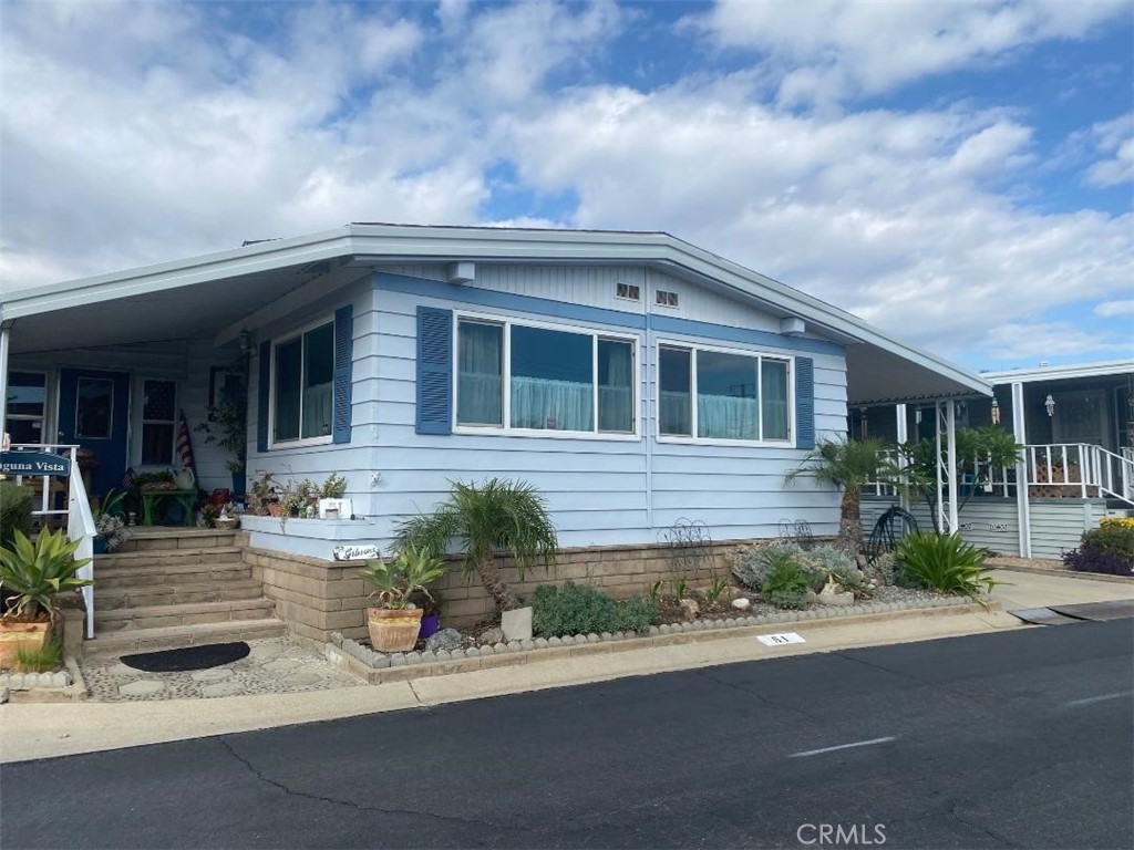 10210 Base Line Road, Unit 51 Alta Loma, CA 91701 - Photo 1 of 19 front view of house with a yard