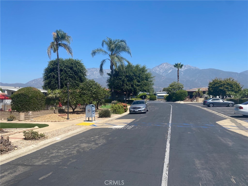10210 Base Line Road, Unit 51 Alta Loma, CA 91701 - Photo 13 of 19 a view of a street with a building in the background