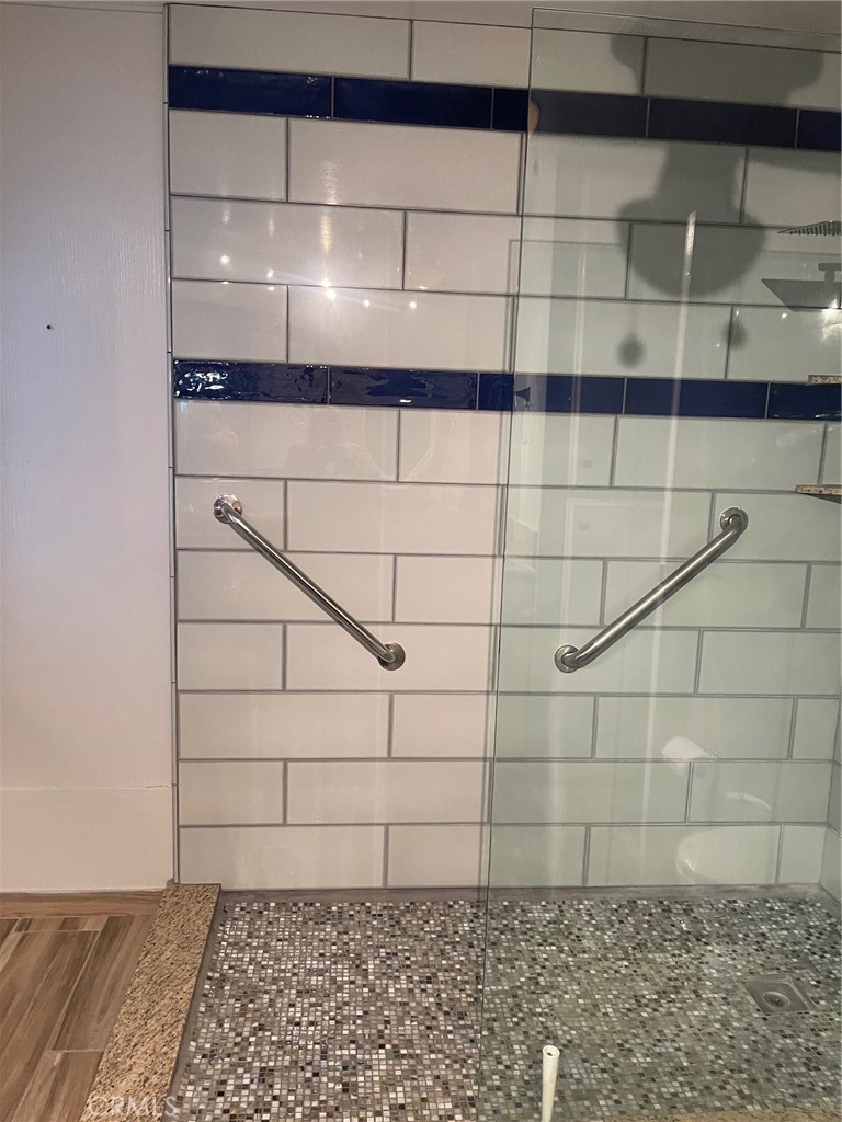 10210 Base Line Road, Unit 51 Alta Loma, CA 91701 - Photo 15 of 19 a bathroom with a shower