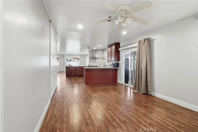 a view of living room with granite countertop furniture and a fireplace