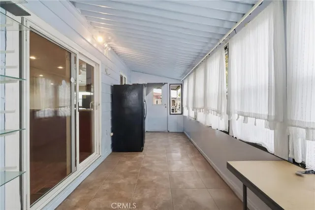 a view of a house with a potted plant