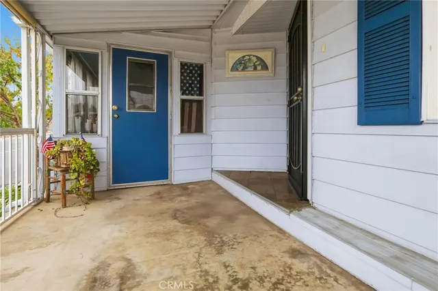 a view of kitchen with stove and wooden floor