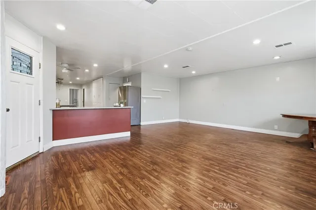 a kitchen with stainless steel appliances granite countertop a stove sink and cabinets