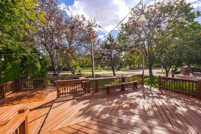 a view of a patio with a table and chairs