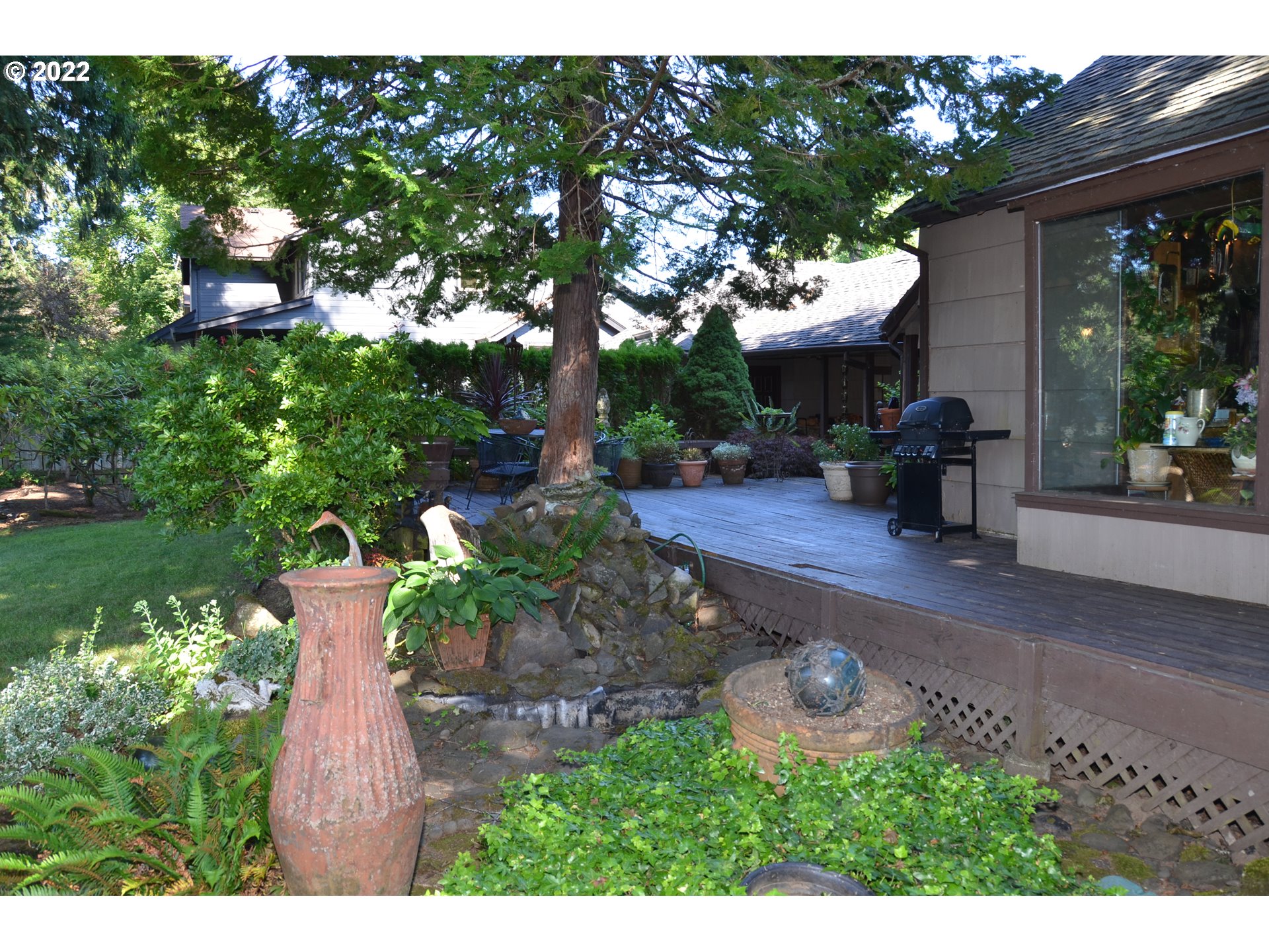19460 Southeast Semple Road Damascus, OR 97089 - Photo 10 of 32 a garden view with a seating space