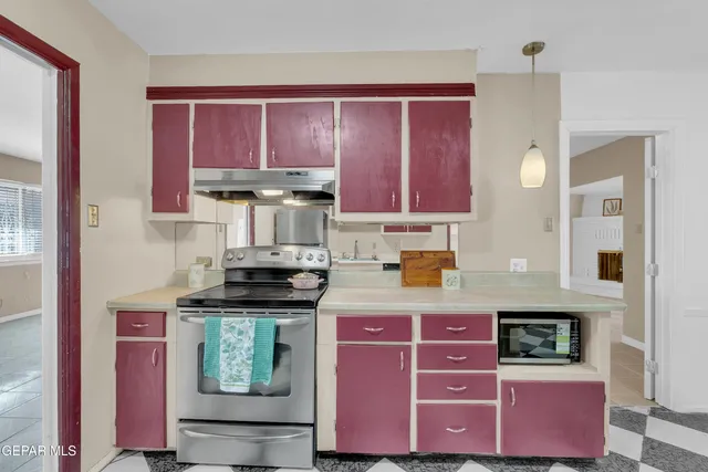 a view of a livingroom with a black and white checkered floor