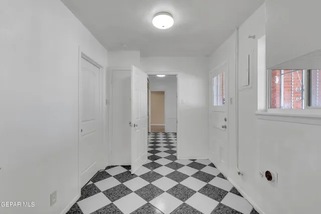 an empty room with windows