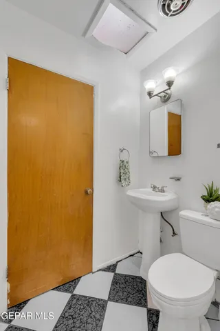 a bathroom with a bathtub and toilet