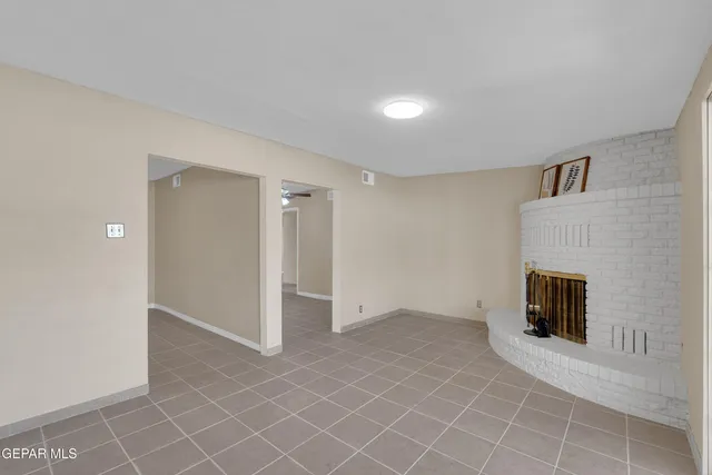 a bathroom with a sink vanity and a mirror