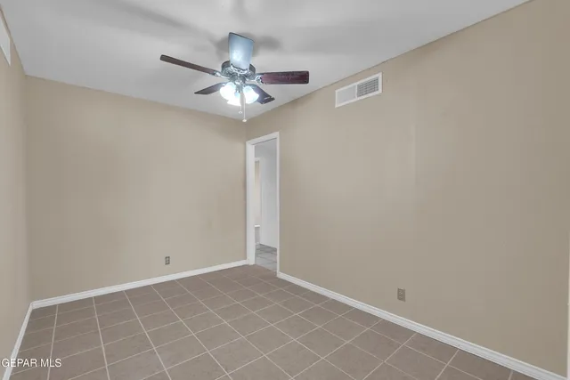 an empty room with an entryway